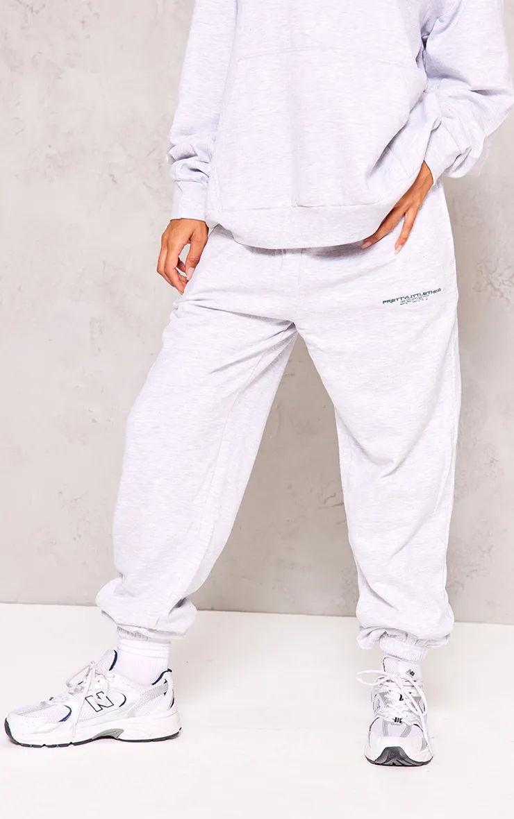 PLT Sport Jogging gris cendré à slogan brodé en gras
